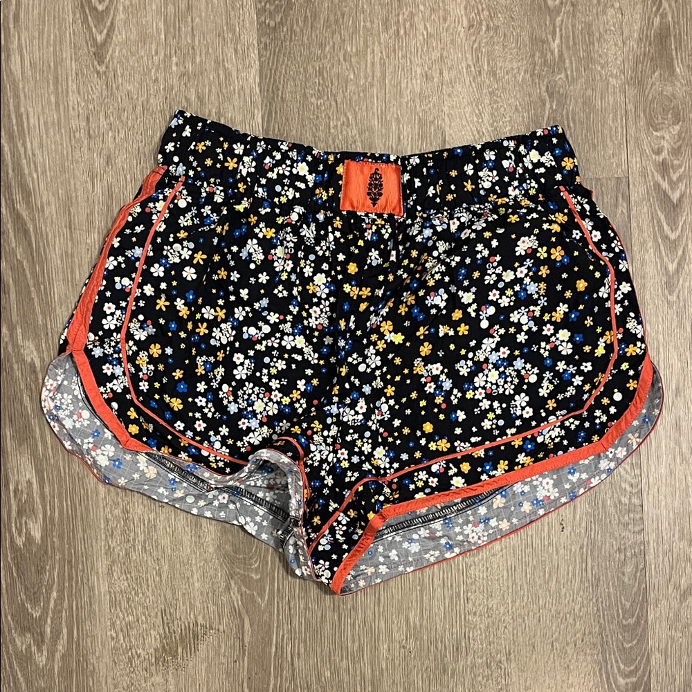 FP Movement Black Floral Athletic Shorts with Red and White Highlights